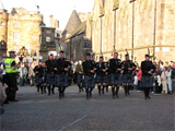 Clan Douglas (image 3) The Caledonian Brewery Pipe Band lead Clan Douglas out through the gates of Holyrood Palace