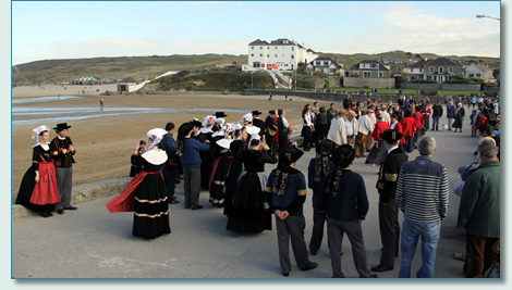 Breton dancers in front of the Ponsmere Hotel for Lowender Peran 2011, Perranporth, Cornwall 