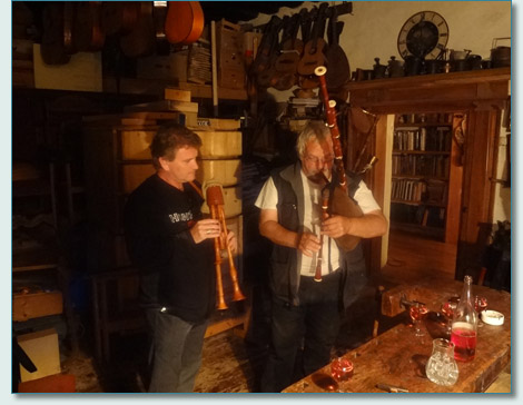 Hamish Burgess and Arnold Lobisser with dudelsack bagpipes in the Brauhaus workshop, Hallstatt, Austria