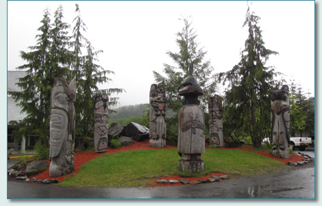Totems in courtyard of Cape Fox Hotel, Ketchican, Alaska